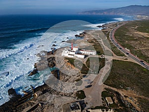 Aerial view from a lighthouse in the Portuguese coastline. Cape raso Lighthouse Cascais, Portugal photo