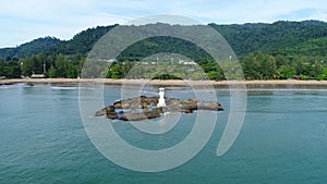 Aerial view of a lighthouse on the sea in Thailand