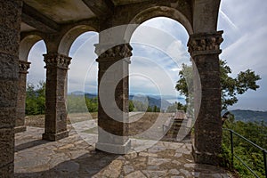 Aerial view of the Ligurian coast through the church colonnade of the Sanctury of Caravaggio, in the municipality of Rapallo, photo