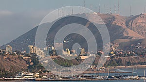 Aerial view of Lima's Coastline with mountain in background timelapse, Lima, Peru. photo