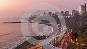Aerial view of Lima's Coastline in the neighborhood of Miraflores day to night timelapse, Lima, Peru photo