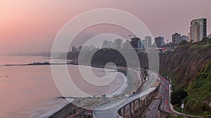 Aerial view of Lima`s Coastline in the neighborhood of Miraflores during sunset timelapse, Lima, Peru