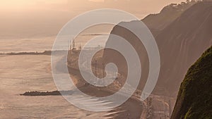 Aerial view of Lima`s Coastline in the neighborhood of Miraflores timelapse during sunset, Lima, Peru