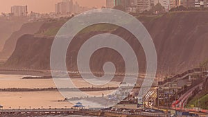 Aerial view of Lima's Coastline in the neighborhood of Miraflores timelapse during sunset, Lima, Peru