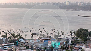 Aerial view of Lima's shoreline with boats including the districts of Barranco and Chorrillos timelapse. Peru photo