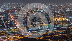 Aerial view of Lima skyline night timelapse from San Cristobal hill. photo