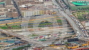 Aerial view of Lima skyline timelapse near Plaza de Toros de Acho bullring from San Cristobal hill. photo
