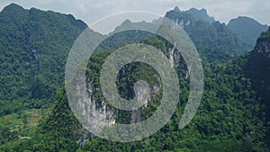 Aerial View of Limestone Rocks Covered with Lush Tropical Greenery. Top View of Mountains in Krabi and Suratthani