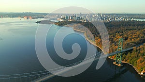 Aerial view of Lions Gate Bridge and Stanley Park at dawn. Canada