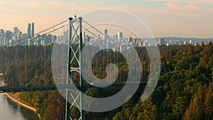 Aerial view of Lions Gate Bridge and Stanley Park at dawn. Canada