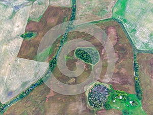 Aerial view. Lithuanian autumn fields by day from above.