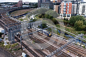 Aerial view of a local passenger train at a major railway junction
