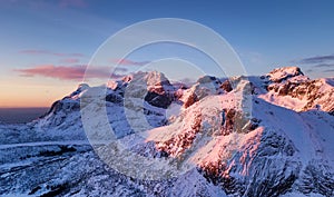 Aerial view at the Lofoten islands, Norway. Mountains during sunset. Natural landscape from air at the drone.