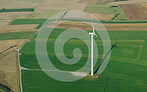 Aerial view of a lonely wind turbine