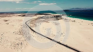 Aerial view of long road and beach