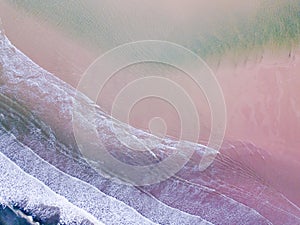 Aerial View looking down on a Welsh Beach in the UK.