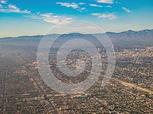 Aerial view of Los Angeles downtown, view from window seat in an airplane