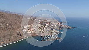 Aerial view of Los Gigantes Cliffs on Tenerife, drone shot from above, Canarias islands, Spain