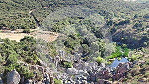 Aerial view of Los Penasquitos Canyon Preserve with the creek waterfall, San Diego