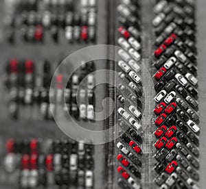 Aerial view lot of vehicles on parking for new car. Black and White selective red colour.