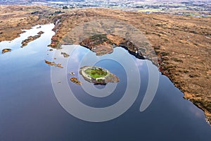 Aerial view of Lough Doon between Portnoo and Ardara which is famous for the medieval fort - County Donegal - Ireland.