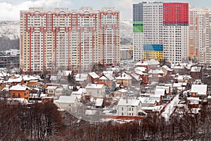 View from above city residential neighborhood of real estate low-rise and high-rise building facade exterior mixed-use