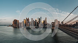 Aerial view of lower Manhattan New York City Downtown. Soft morning light sunrise. Financial distict United States.