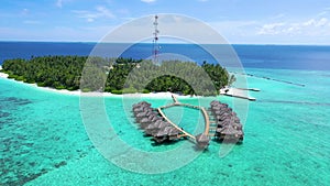 Aerial view of luxurious tropical island paradise water villas