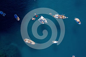 Aerial view of the luxurious yachts sailing on the calm blue Adriatic Sea