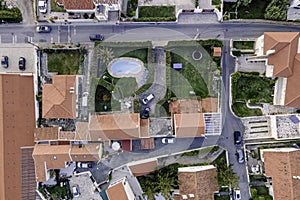 Aerial view of a luxury residential district, view from top of roofs with private swimming pool, Colares, Portugal
