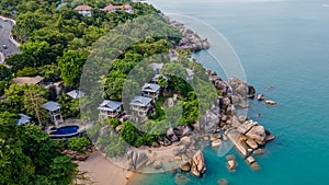 Aerial view of luxury tropical resort villas with pools on rocks near ocean in Thailand.Koh Samui. Landscape.Asia. Drone.