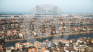 Aerial view of luxury villas on the Palm Jumeirah island. Dubai, UAE