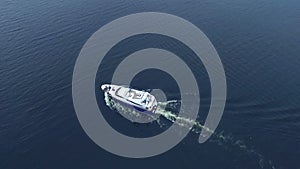 Aerial view of luxury yacht sailing sea. Ocean travel boat. Cruise vacation