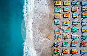 Aerial view of lying woman on the beach