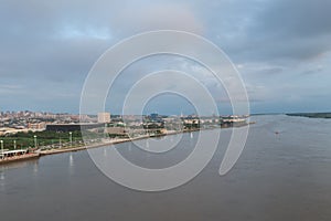 Aerial view of the Magdalena river with buildings of the city of Barranquilla in the background. Colombia.