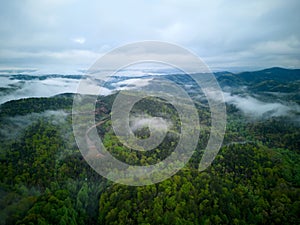 Aerial view of a majestic green Great Smoky Mountains, TN under a cloudy sky