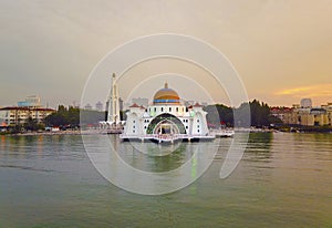 Aerial view of Majestic Malacca Straits Mosque during sunset