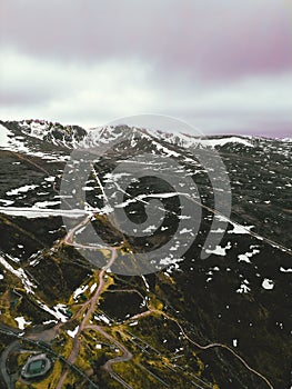 Aerial view of majestic snow-covered mountains in Scottish Highlands