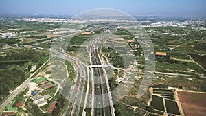 Aerial view of major highway traffic on a sunny day, Autopista del Mediterraneo, Spain photo