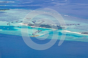 Aerial view of Maldives beach landscape. Maldives island view from seaplane or drone