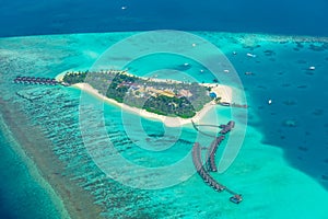 Aerial view of Maldives beach landscape. Maldives island view from seaplane or drone