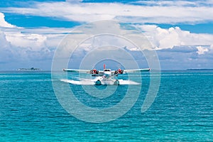 Aerial view on Maldives island, Ari atoll. Tropical islands and atolls in Maldives from aerial view. Summer vacation holiday