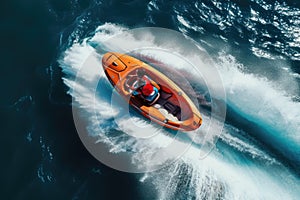 Aerial view of a man driving a speedboat in the ocean, Aerial top down view of slalom made by speed boat on a Kayak sailing