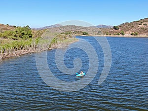 Aerial view of man kayaking on Lake Hodges, San Diego County, California