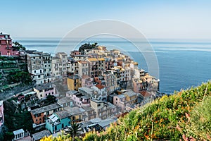 Aerial view of Manarola,Cinque Terre,Italy.UNESCO Heritage Site.Picturesque colorful village on rock above sea.Summer holiday,