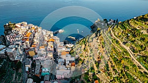 Aerial view of Manarola,Cinque Terre,Italy.UNESCO Heritage Site.Picturesque colorful village on rock above sea.Summer holiday,