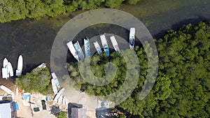 Aerial view of the mangrove forest on Junggut Batu, Nusa Lembongan. There are several fisherman`s houses around there. White sand