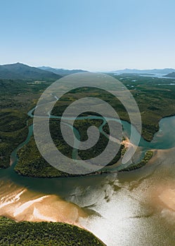 Aerial view of Mangroves in Hinchinbrook National Park. Mountains, rivers and Ramsay Bay Beach along the Thorsborne photo