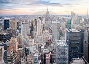 Aerial view of Manhattan skyline, skyscraper in New York City at sunset in evening