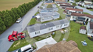 Aerial View of a Manufactured, Mobile, Prefab Home Being Removed photo